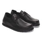 Zapatos Birkenstock Utti Natural Leather Black, par completo en tres cuartos