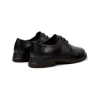 Zapatos Camper Iman Bajo Negro, vista trasera en tres cuartos