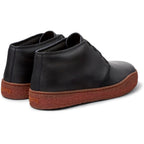 Botas y Botines Camper Peu Terreno Negro, vista trasera en tres cuartos