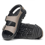 Sandalias Birkenstock Mogami Terra Apex Concrete Gray, par en ángulo, suela a la vista