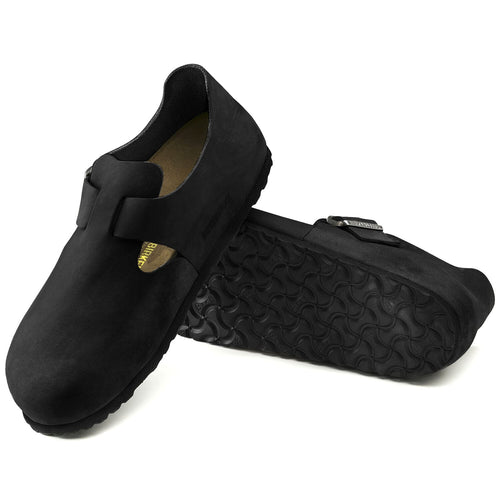 Zapatos Birkenstock London Oiled Black, par completo en tres cuartos, con la suela a la vista