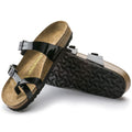 Sandalias Birkenstock Mayari Black Lack, par completo con vista de la suela