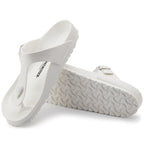 Sandalias Birkenstock Gizeh EVA White, par completo en tres cuartos, con la suela a la vista