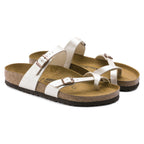 Sandalias Birkenstock Mayari Graceful Pearl White, par completo en tres cuartos
